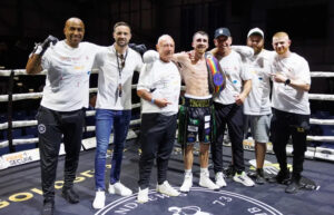 matthew mchale with his boxing team